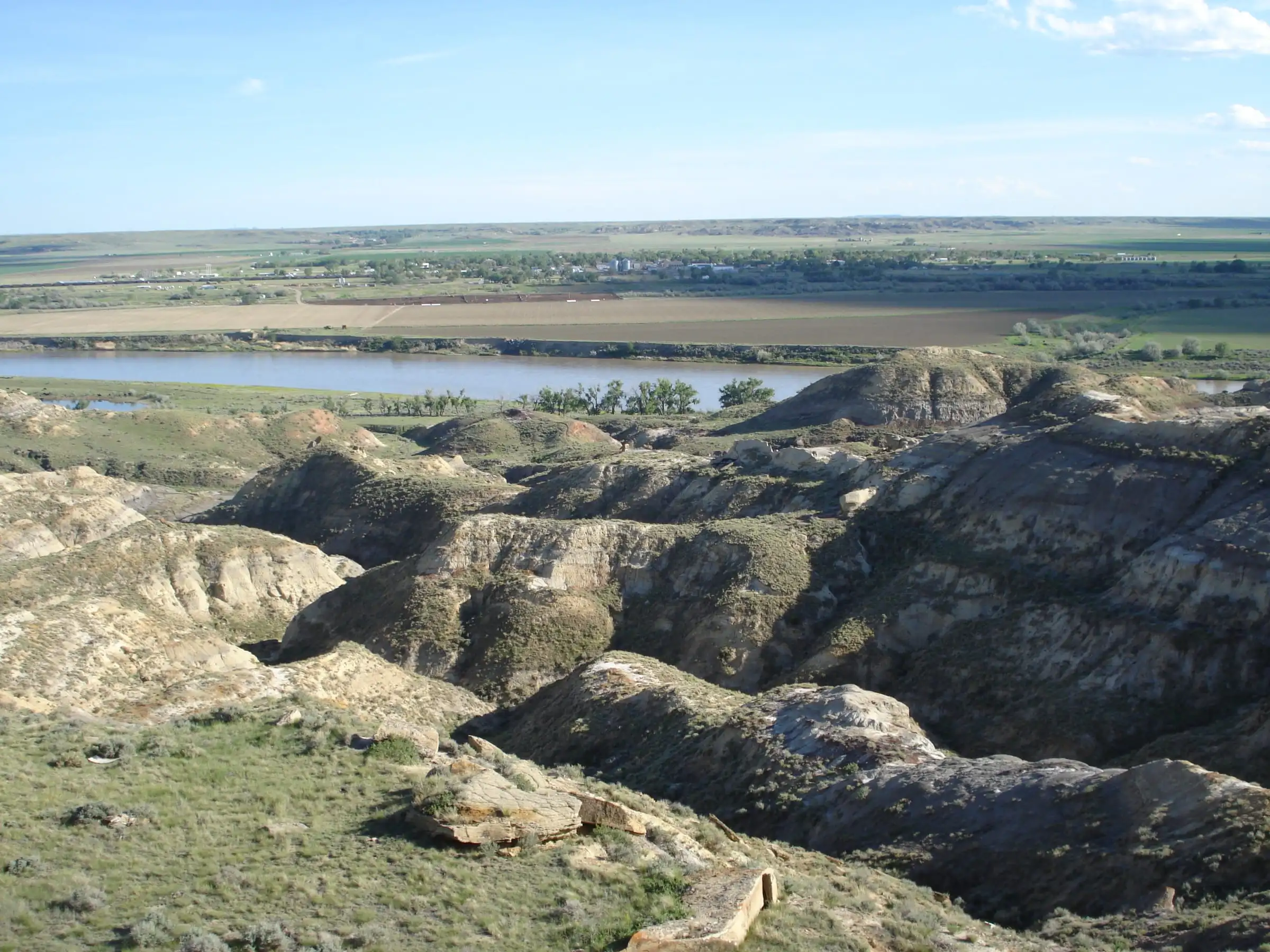 The town of Terry seen from a butte in the badlands, across the Yellowstone River and farm fields